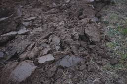 Freshly ploughed soil in an English farm field